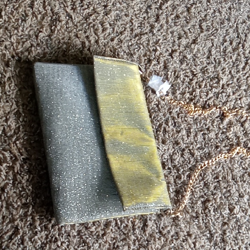 A New Day Gold and Silver Clutches